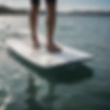 Battery-Powered Foil Board in Action Battery-powered foil board gliding over water