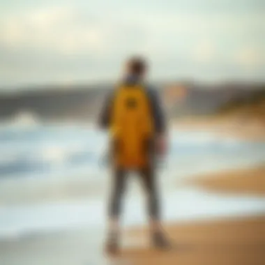 A person comfortably carrying a surf fishing backpack while walking along the shoreline.
