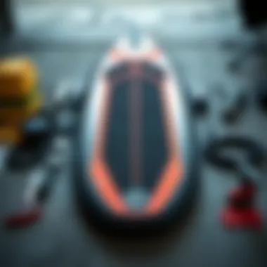 Maintenance and Care for Cabrinha Foil Board Cabrinha foil board components laid out for maintenance and care demonstration