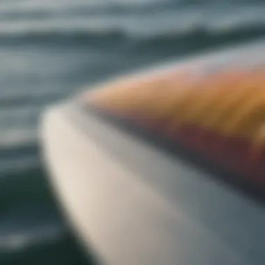 Close-up of thruster fins on a surfboard