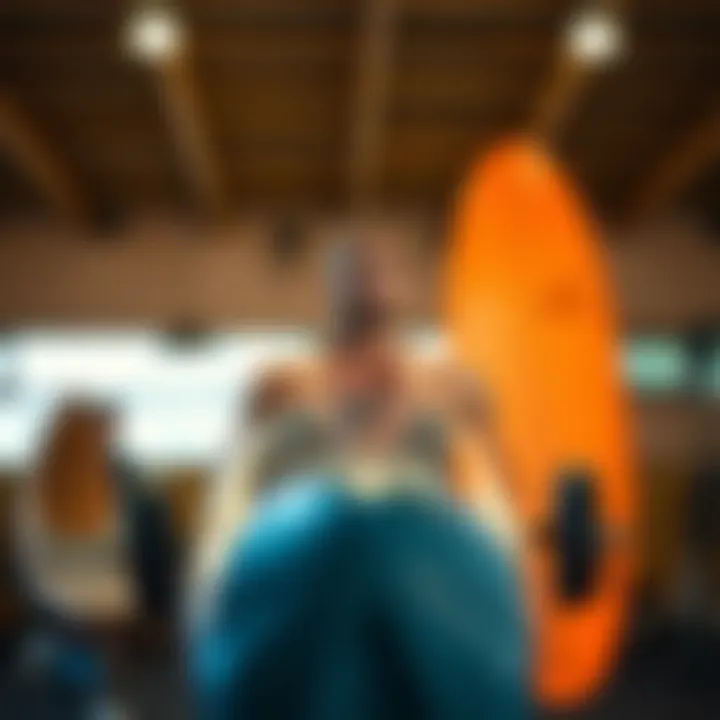 An athlete engaging in strength training with surfboards as weights