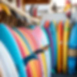 Colorful surfboards lined up at a rental shop