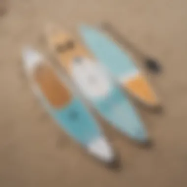 Side-by-side comparison of various paddle board dimensions laid out on a beach