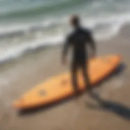 Surfer evaluating leash size with surfboard