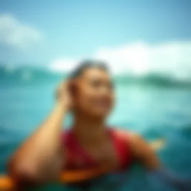 A person tilting their head to one side to remove water from their ears