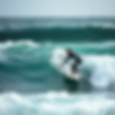 Surfer practicing in challenging waves