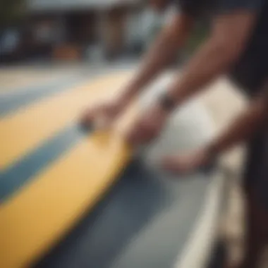 Demonstration of strap installation on a surfboard