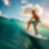 Surfer riding a wave on a pristine Maui beach