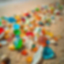 A close-up view of vibrant beach glass pieces scattered on the sandy shore.