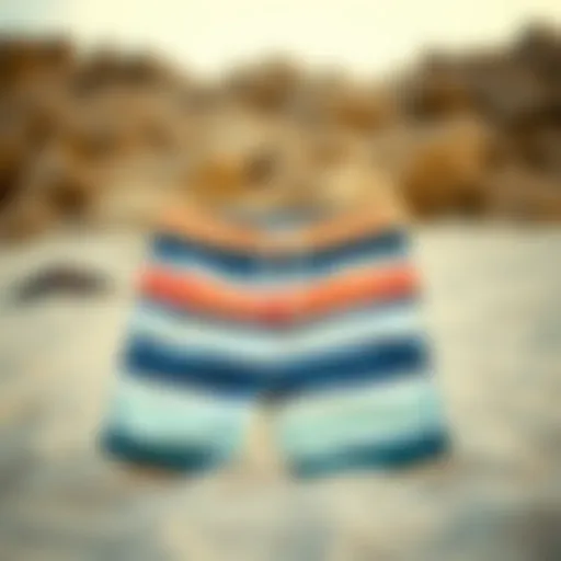 Stylish boardshorts displayed on a sandy beach