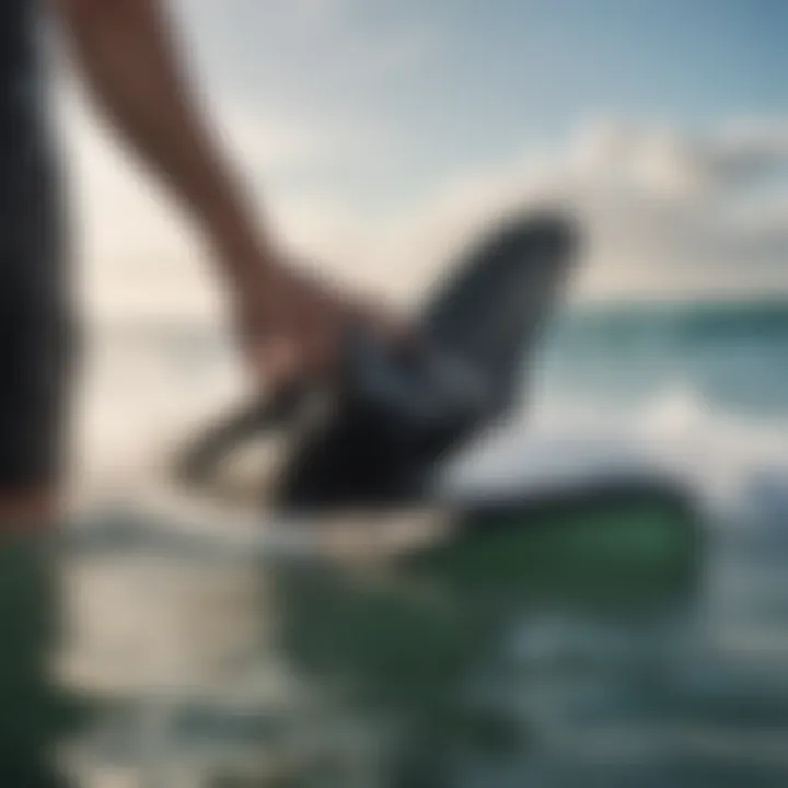 A person testing bodyboard flippers in the ocean