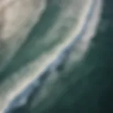 Aerial view of La Lancha beach showcasing its pristine waves and coastline