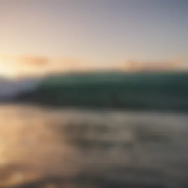 Surfers riding the waves at sunset