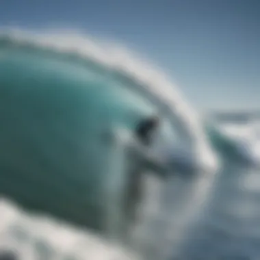 Surfer riding the long left waves of Pavones