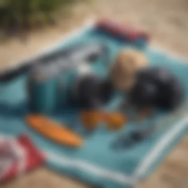 Surf gear laid out on a beach towel