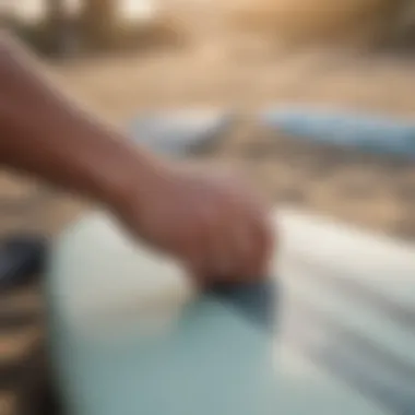 Demonstration of applying grip tape on a surfboard