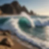 Majestic waves crashing against the rocky shore of Cabo San Lucas.