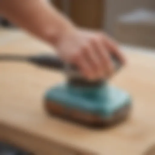 Close-up view of SurfPrep 3x4 Electric Sander showcasing its ergonomic design and features