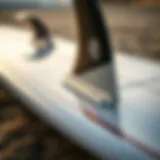 Close-up of a surfboard with foil attachment