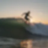 Surfing waves at Newport during sunset