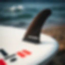 FCS II fin system on a surfboard