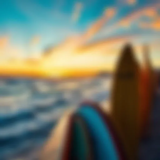 A vibrant sunset over the ocean with surfboards lined on the shore