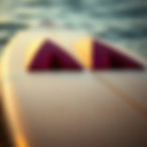 Close-up of Naish Triad surfboard design details showcasing its unique contours and shapes.