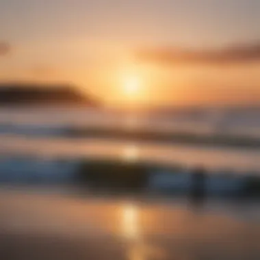 Sunset over Rockaway Beach with surfers