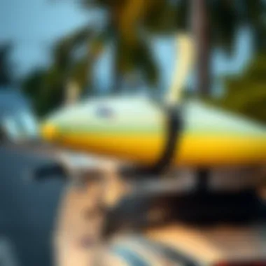 Close-up view of surfboard securely attached to scooter rack