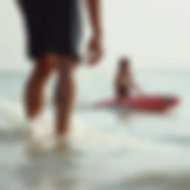 Beginners taking surf lessons on the beach