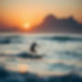 Surfing at sunset in Lima's coastline