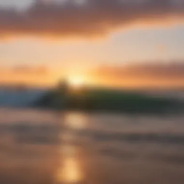 Surfers riding the waves at sunset