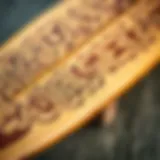 A beautifully carved surfboard showcasing intricate designs