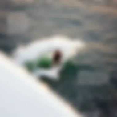 Wakesurfer Riding the Wave A dynamic shot of a wakesurfer skillfully riding the wave behind a boat