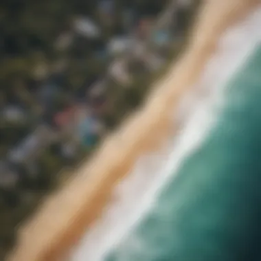 Aerial view of a popular surf beach during peak season