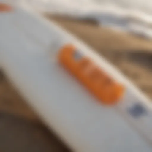 Close-up view of Tropicsport Mineral Sunscreen Lotion SPF 30 on a surfboard