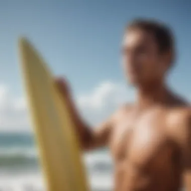 Surfer Applying Sunscreen Before Surfing Surfer applying Tropicsport Mineral Sunscreen Lotion before hitting the waves