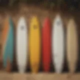 Diverse range of surfboards displayed on a beach