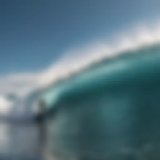 Surfer riding a wave under clear skies