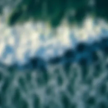 Aerial view of ocean waves crashing on the shore