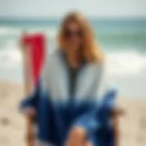 Stylish surf poncho draped on a beach chair
